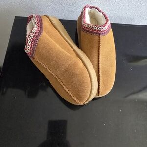 Warm Tan Kids Slippers with Red Accents